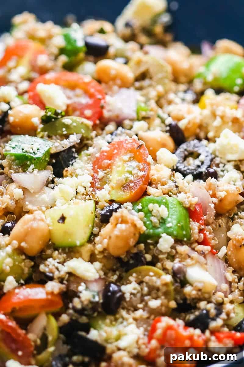 Vibrant and Healthy Mediterranean Quinoa Salad 4 A vibrant close-up of the Mediterranean quinoa salad, highlighting the fresh textures and colors of the ingredients.