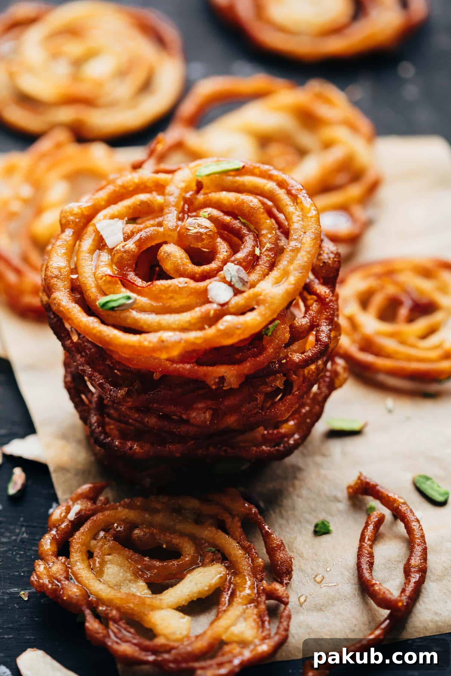Thin and Crispy Homemade Jalebis 3 Jalebis stacked on top of each other