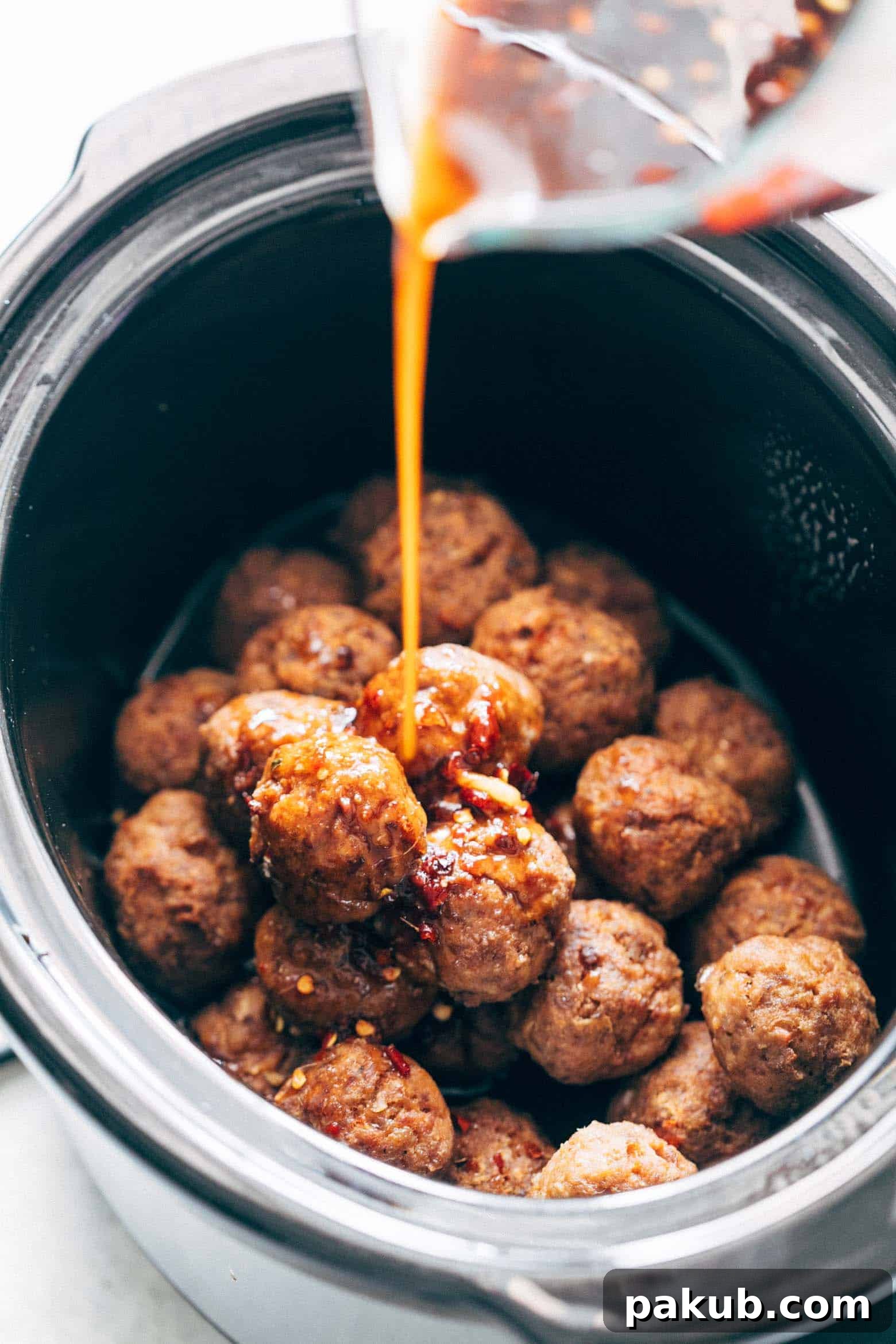 Asian inspired slow cooker teriyaki meatballs with pineapple are super easy, low carb and can be made in your crockpot. Juicy, succulent, these teriyaki pineapple meatballs can also be baked in the oven.