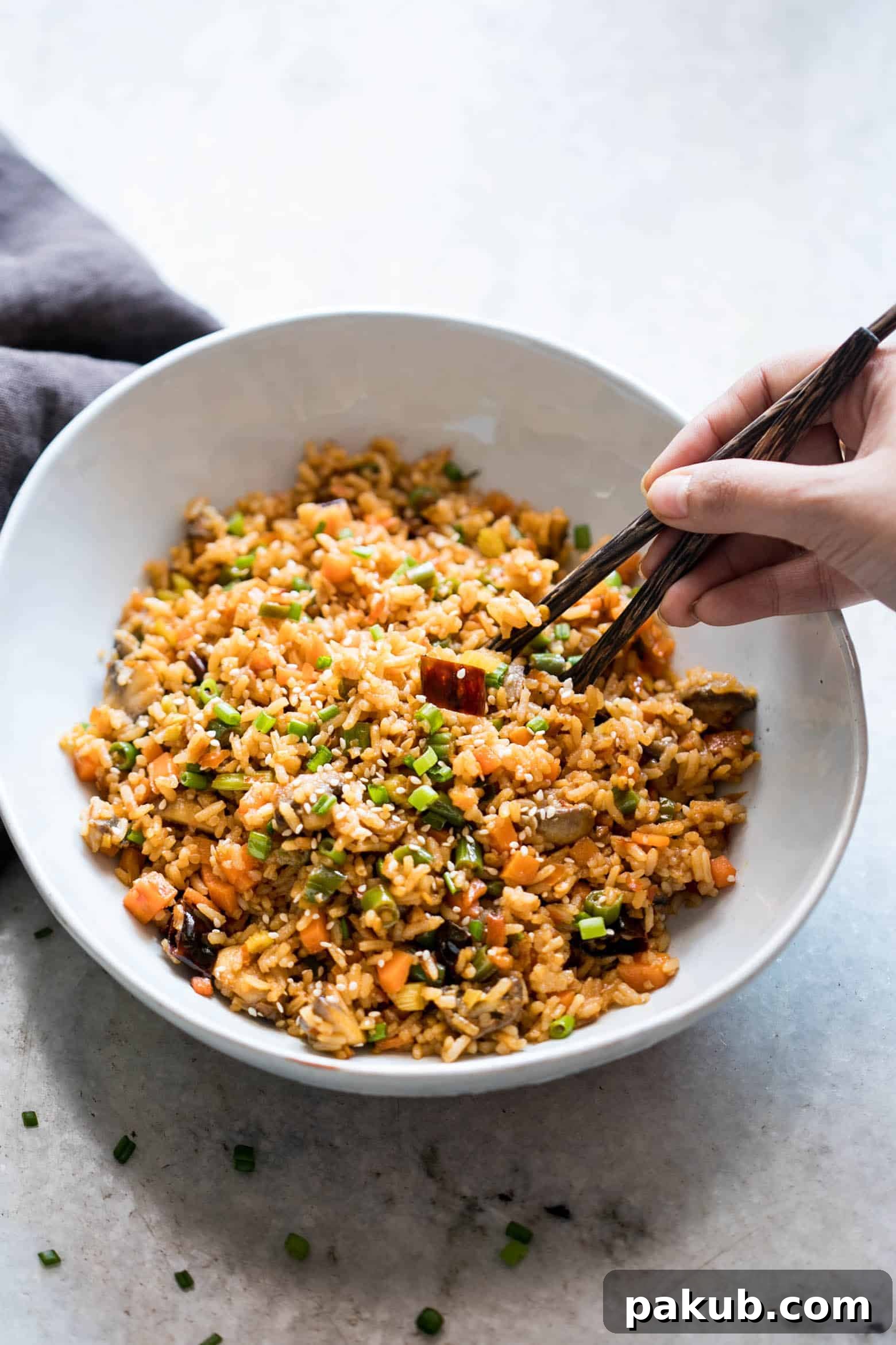 This is the best chinese schezwan fried rice you'll make - loaded with vegetables, spicy and super easy! Made with sichuan sauce, it's the best way to use leftover rice.