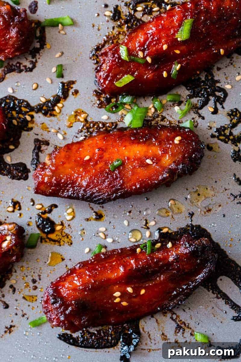 Spicy, crispy, full of umami and insanely addictive Korean baked gochujang chicken wings. You'll never go back to having wings any other way!