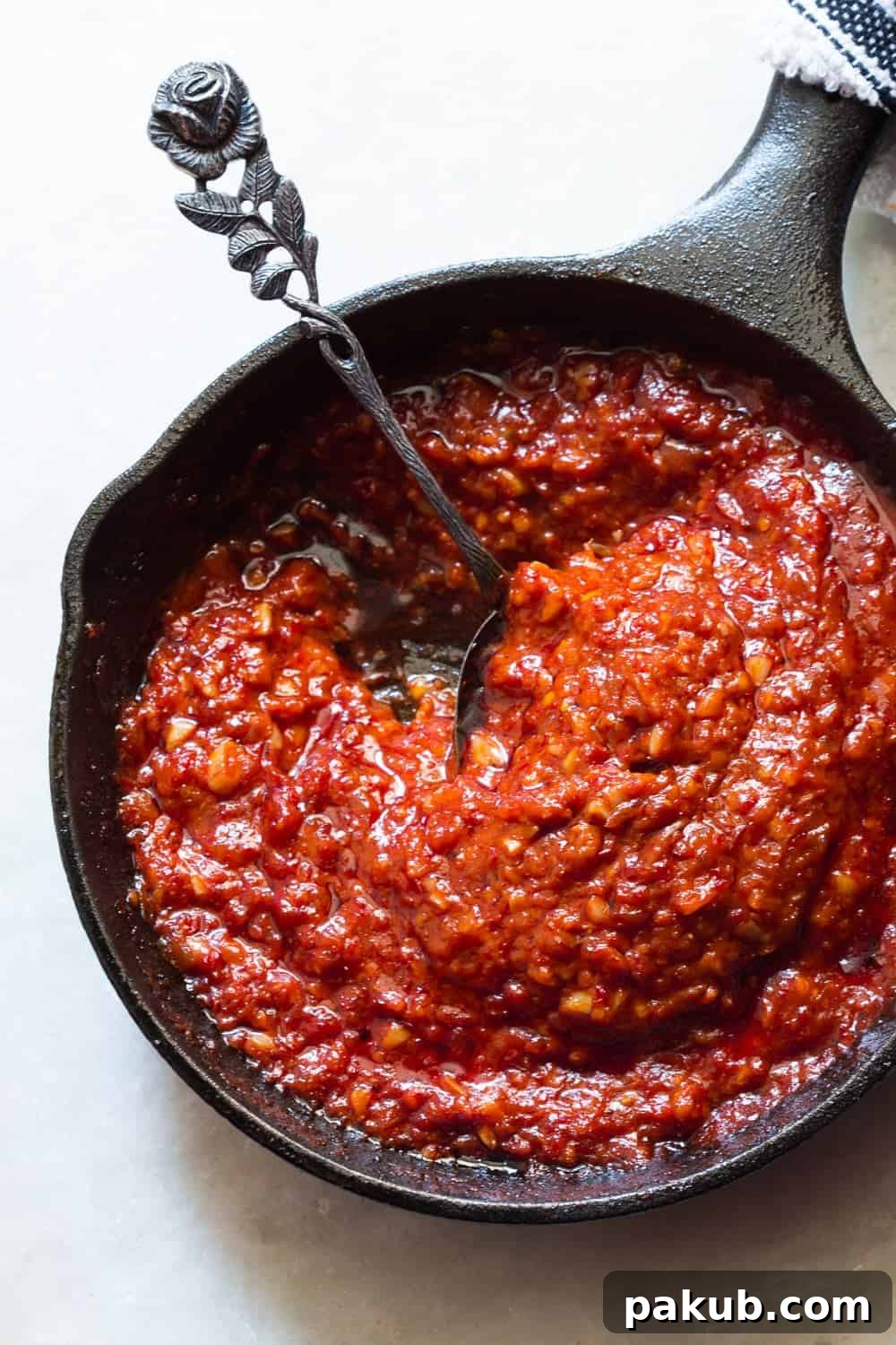 The fiery hot homemade Schezwan sauce.