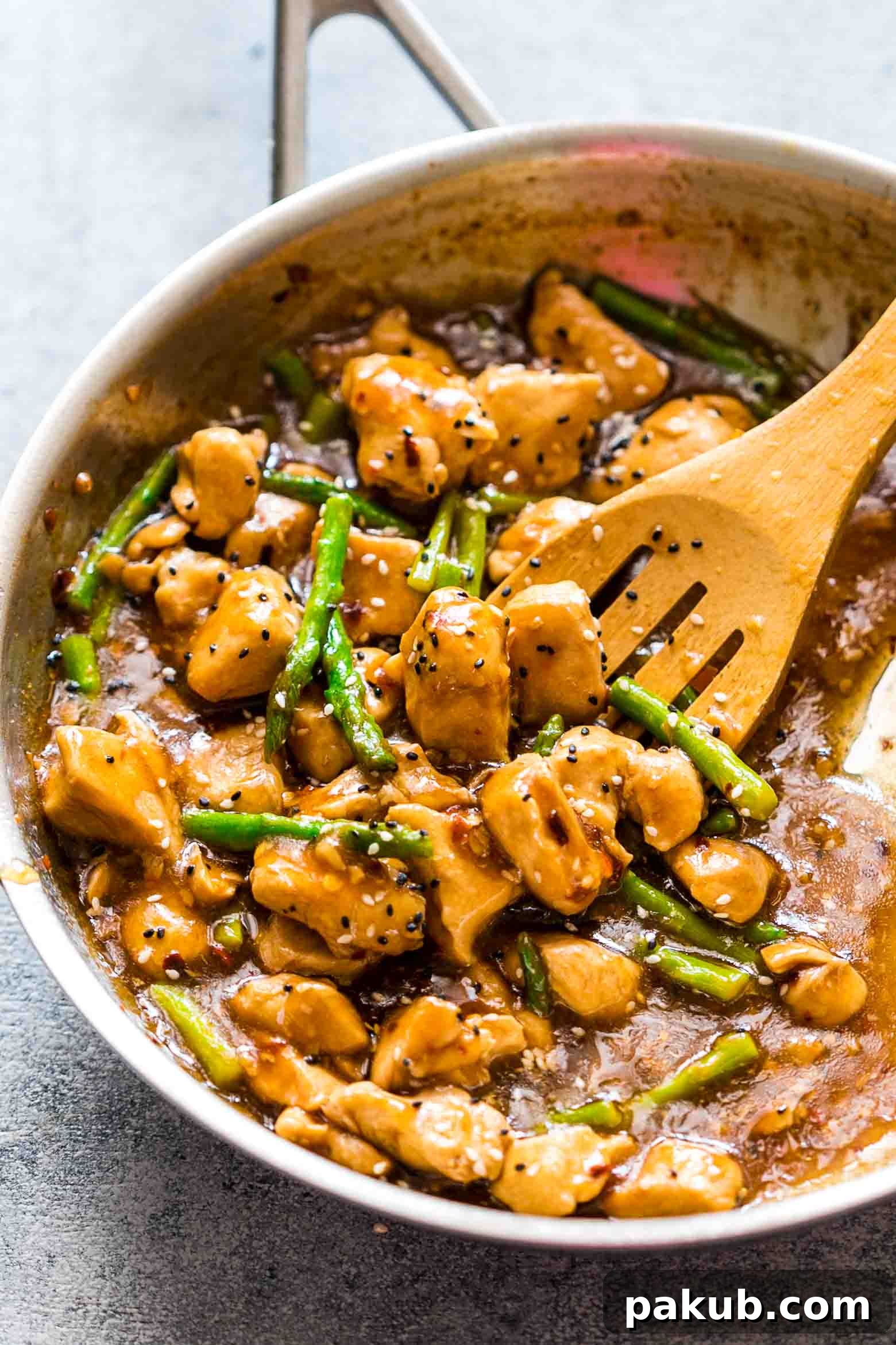 Easy lemon ginger chicken asparagus stir fry is a quick, 30 minute asian recipe that's sure to be a hit with the family. It's low carb and can gluten free too so you can enjoy it guilt-free!