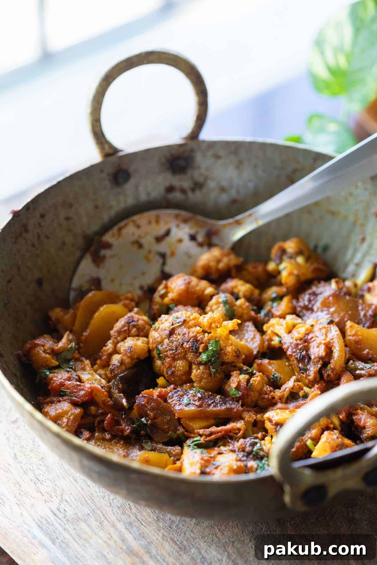 Aloo Gobi Masala served straight from the kadhai or wok, ready to be enjoyed