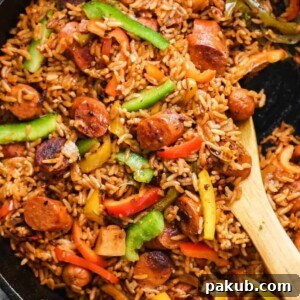 One Pot Mexican Rice and Sausages served in a cast iron pan