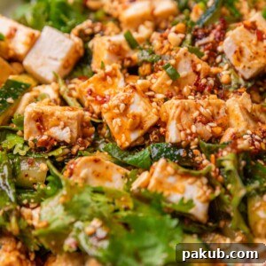 A close up image of Asian cucumber salad to show it's texture