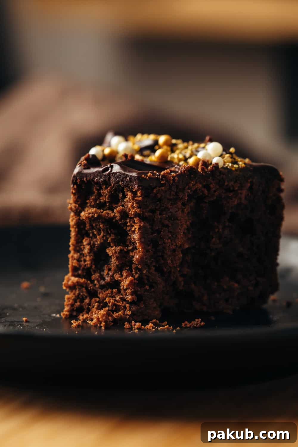 Incredibly Soft and Moist Eggless Chocolate Cake 4 A detailed image showcasing the light, airy, and moist crumb structure of the eggless chocolate cake