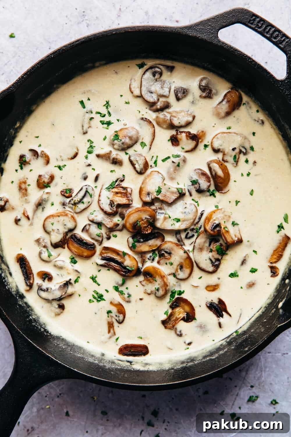 Creamy parmesan mushroom sauce in the pan, ready to be served