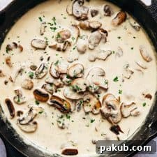 Creamy parmesan mushroom sauce in the pan, ready to be served
