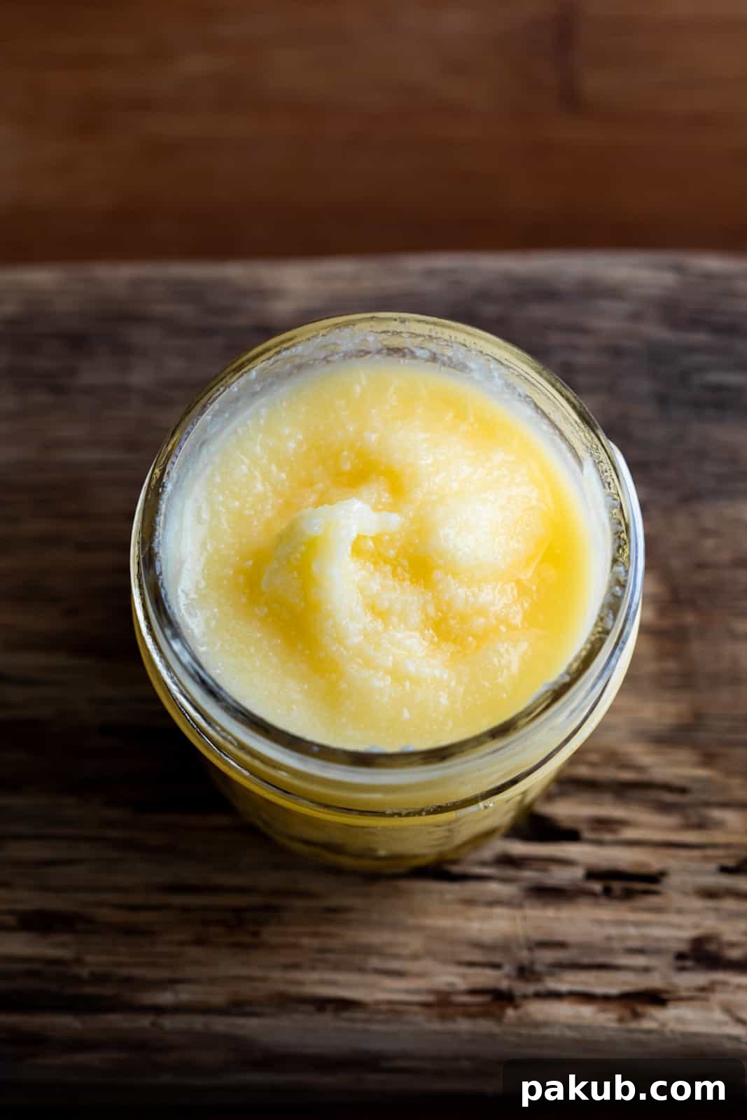 Closeup of the rich, grainy texture of freshly made ghee.