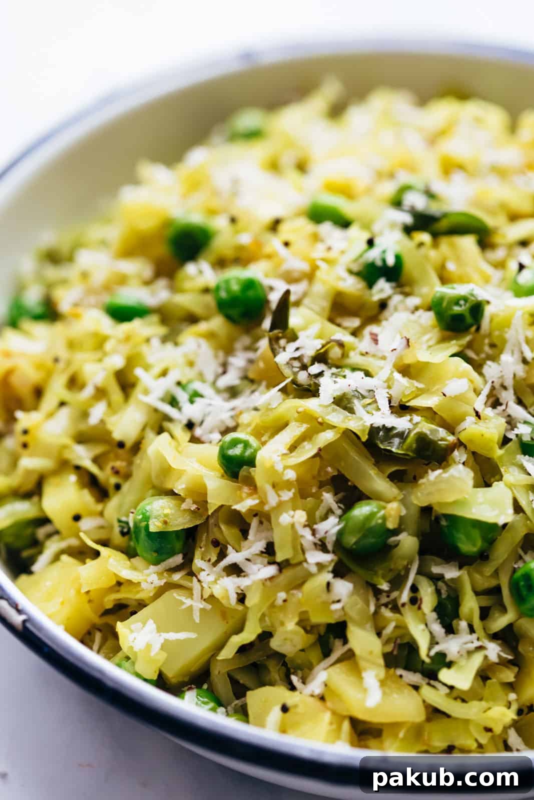 Savory Cabbage Potato Sauté 3 Close up of potato cabbage fry served in a bowl