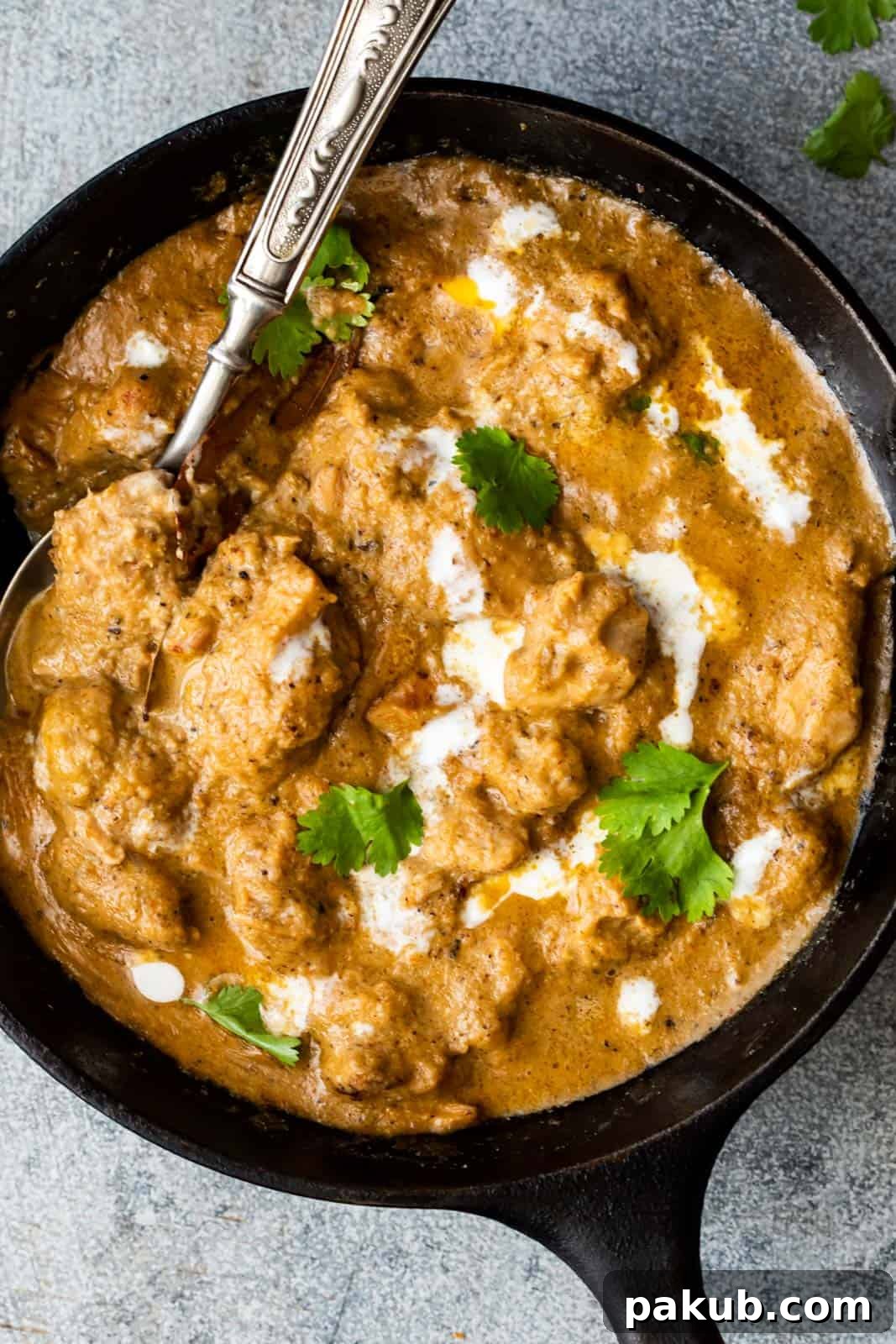 Effortless Homemade Chicken Korma 3 Sliced onions being caramelized in a pan for Chicken Korma