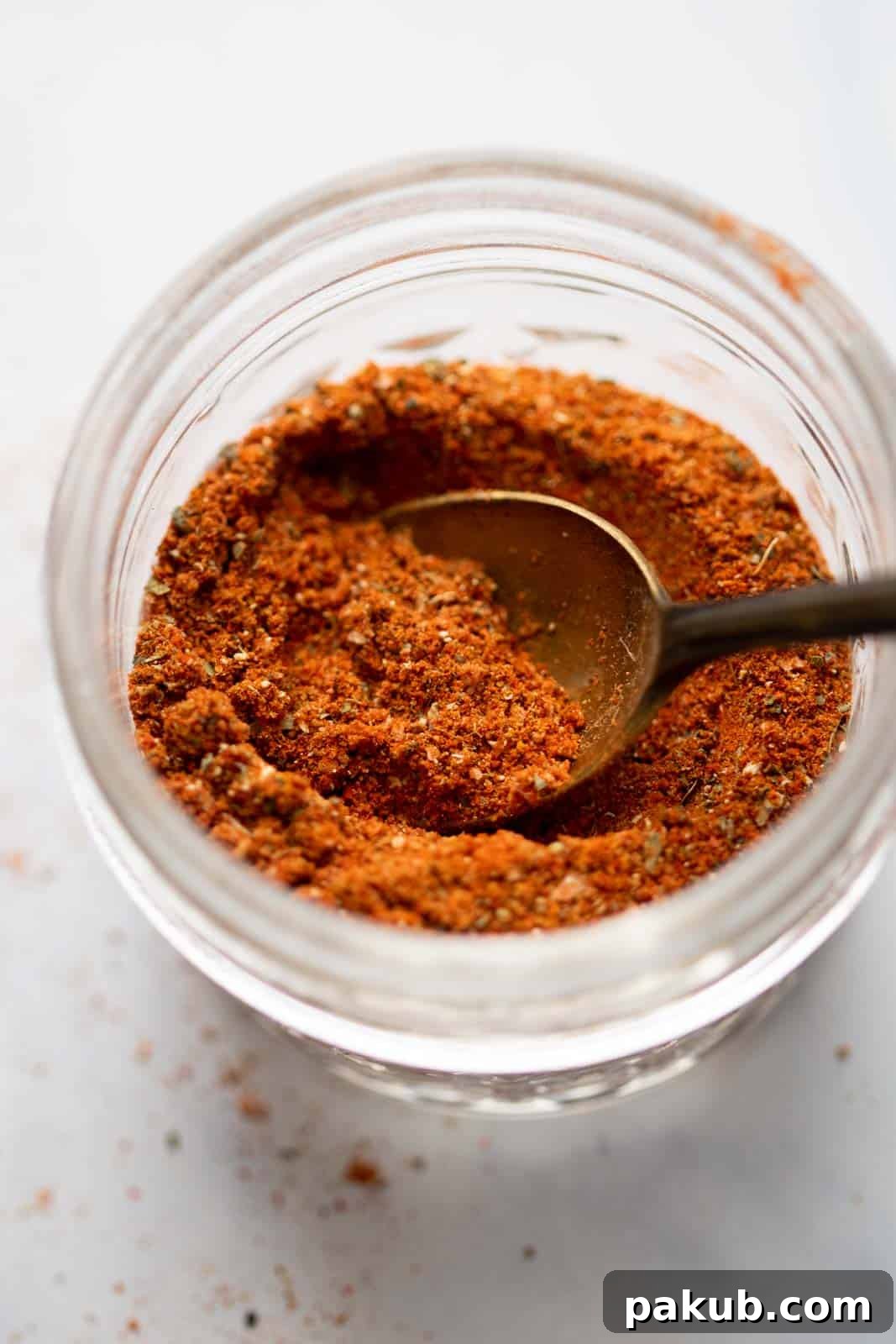 Homemade Street-Style Chicken Shawarma 3 Seasoning for chicken shawarma stored in a jar