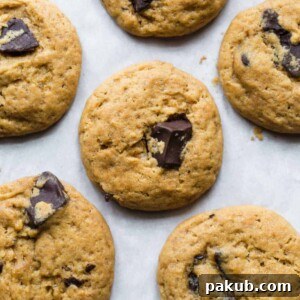 Eggless chocolate chips cookies freshly baked on a cookie sheet