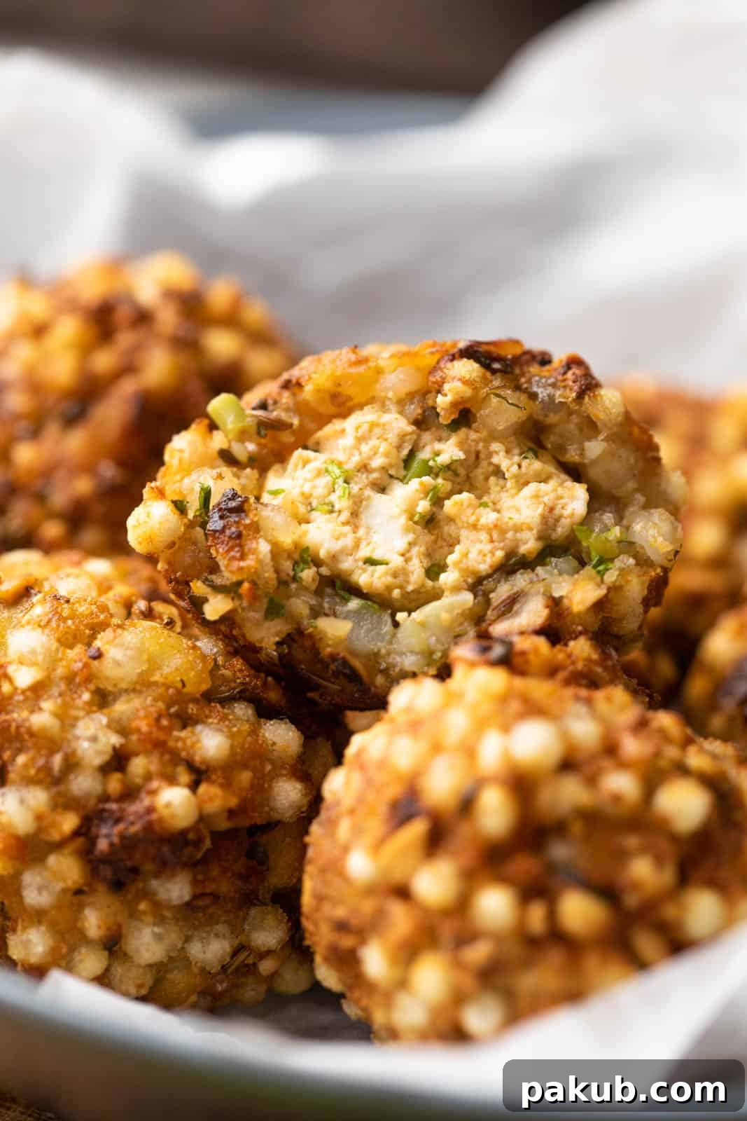 Golden Sabudana Vada: A Paneer Delight 3 Closeup of the stuffing inside sabudana vada, revealing the soft paneer filling