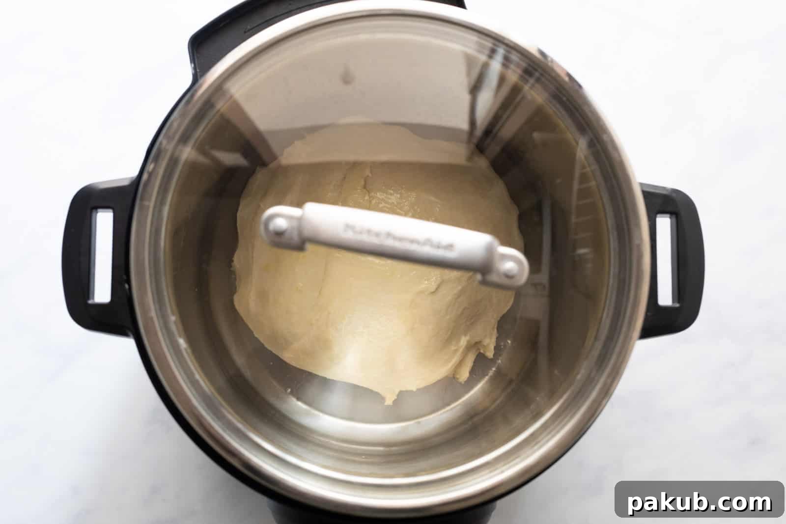 Glass lid placed over the Instant Pot containing dough to facilitate proofing.