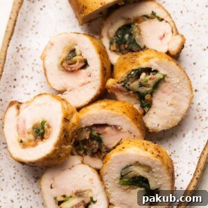 Sliced pieces of Chicken Roulade served on a platter