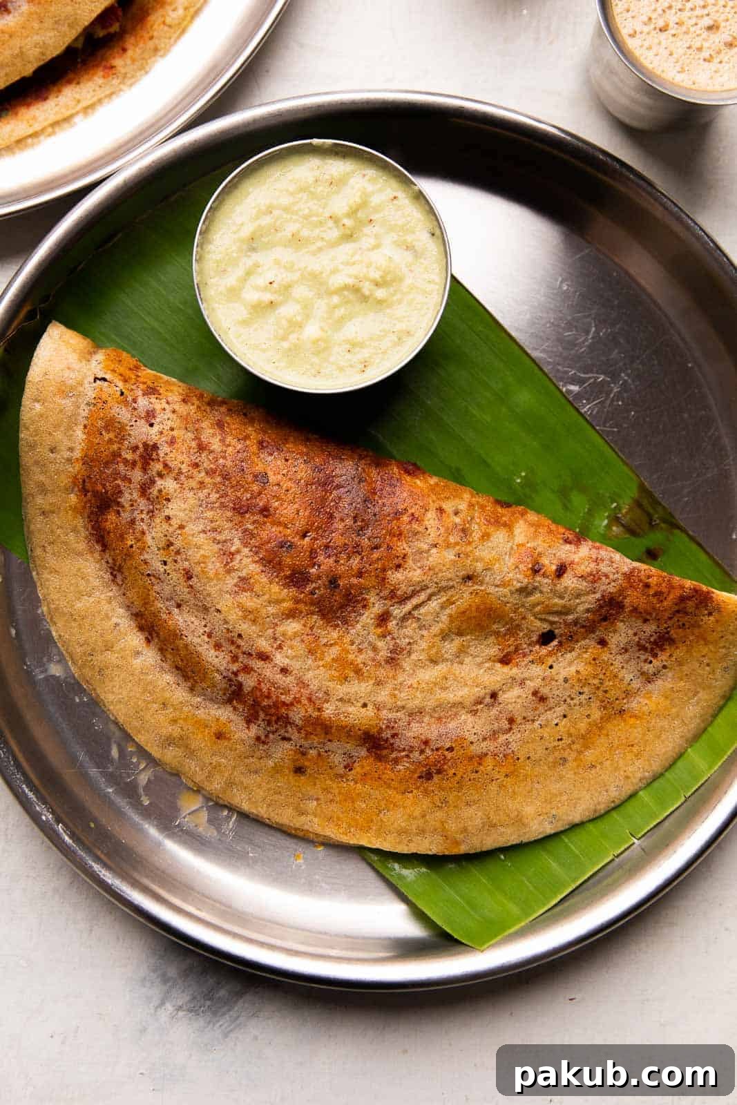 Crispy Millet Mysore Masala Dosa served with chutney and filter coffee, a healthy and delicious South Indian breakfast