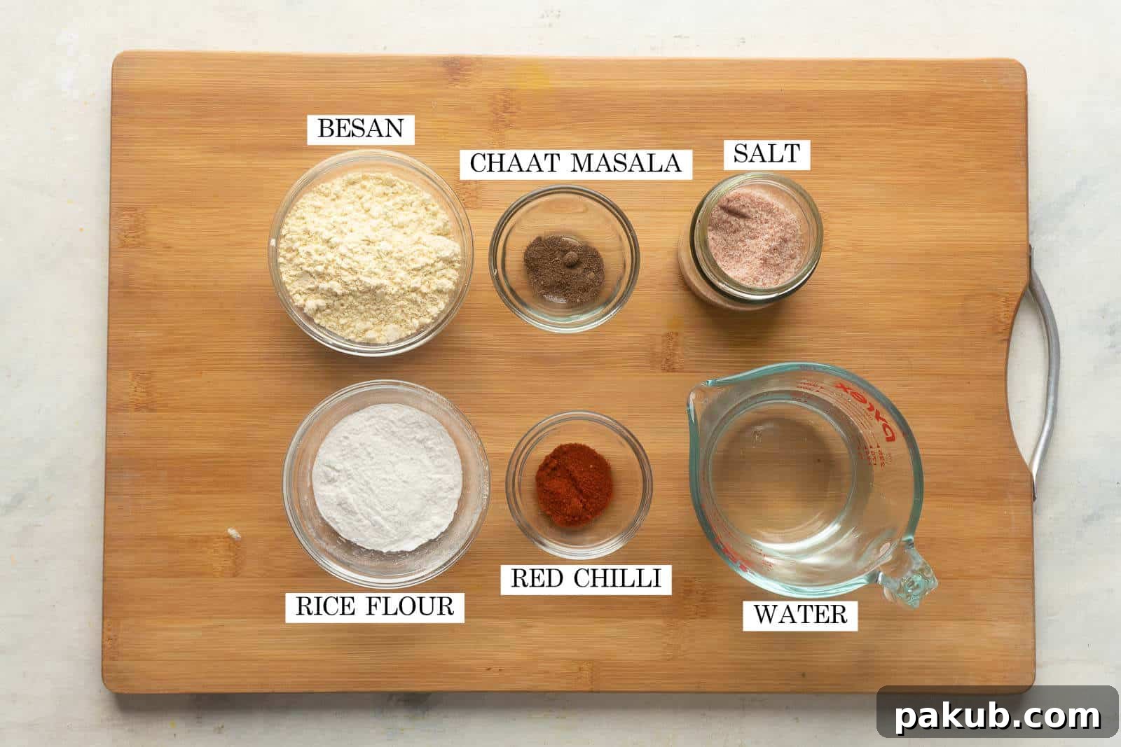 Picture of all the ingredients for the mirchi bhajiya batter