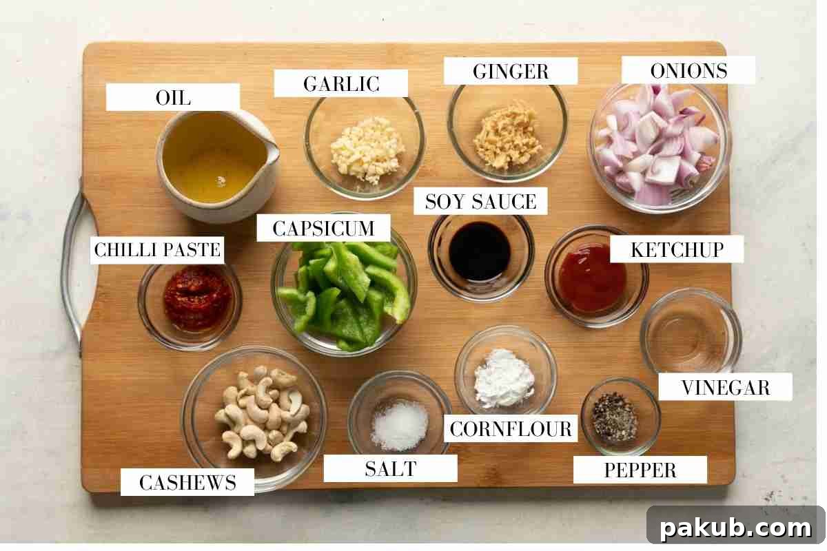 Ingredients for making dragon chicken laid out on a table with text to identify them