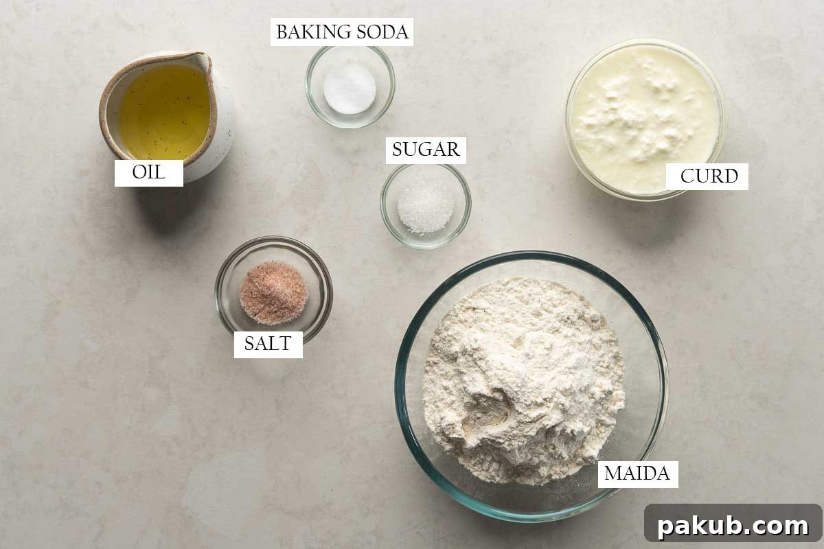 All the ingredients for the dough pictured together with text to identify them