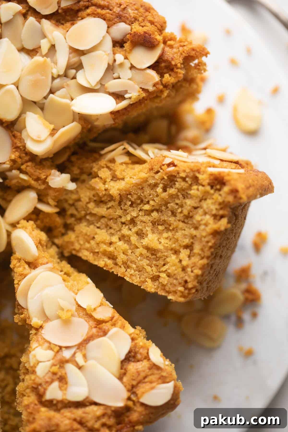 Closeup of a slice of mawa cake to show the texture of the crumb