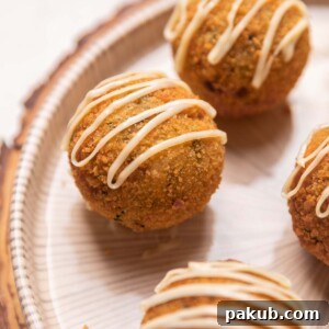 a close up image of chicken curry rice balls placed on a platter