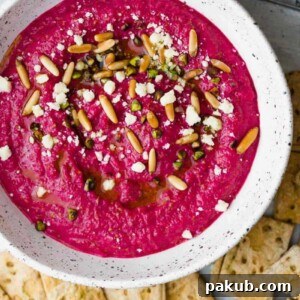 Egyptian Beetroot Dip in a white speckled bowl.
