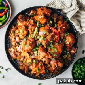 Easy Chinese Chilli Chicken Dry in a black wok.