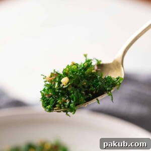 Crispy fried spinach in a spoon