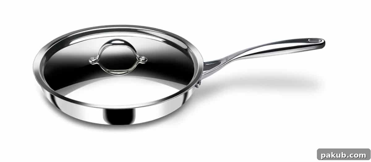 My Favorite Kitchen Workhorses of 2022 16 A pristine Stahl Tri-ply Stainless Steel Frying Pan, reflecting its durable and even-heating surface, a versatile choice for healthy cooking.