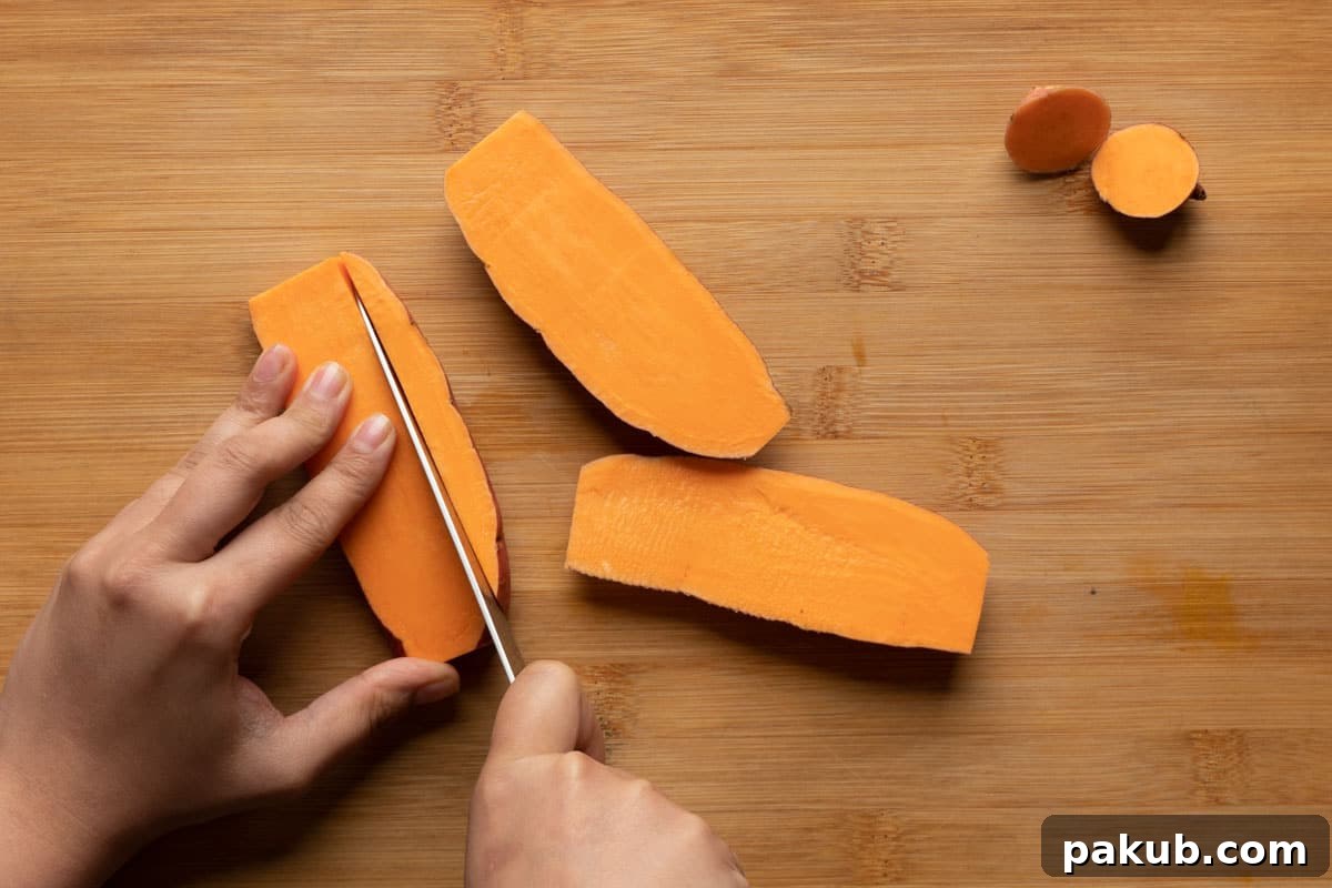 Precision cutting of sweet potato planks into 1/4 inch thick fries