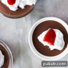 A rich and creamy microwave chocolate pudding, beautifully presented in a serving dish.