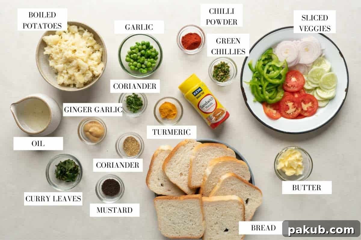 Mumbai Street Toastie 3 A vibrant flat lay image showcasing all the fresh ingredients for a Bombay Sandwich: bread slices, boiled potatoes, onions, tomatoes, capsicum, and a jar of green chutney.