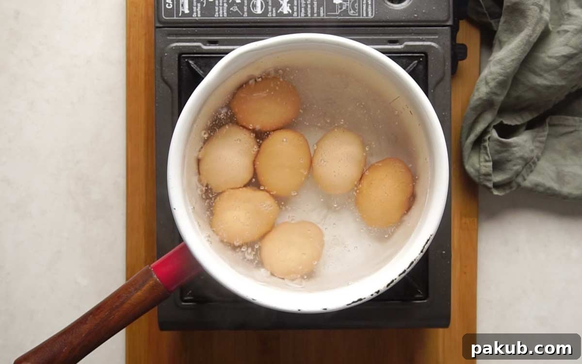 Perfect Hard Boiled Eggs Every Time 4 Picture showing how to make hard boiled eggs - Water coming to a boil