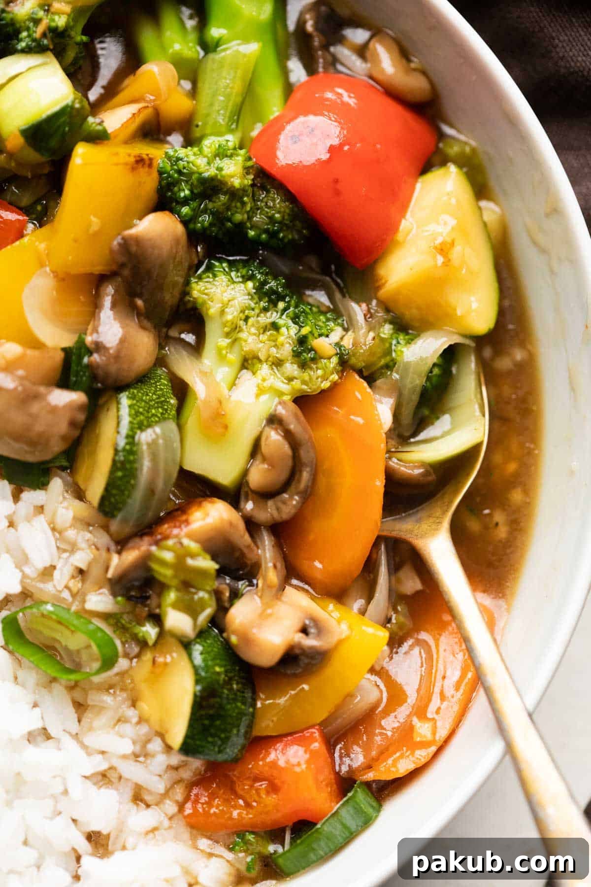 Stir-Fry Fundamentals 2 Closeup of Asian Veg Stir Fry served in a bowl over white rice
