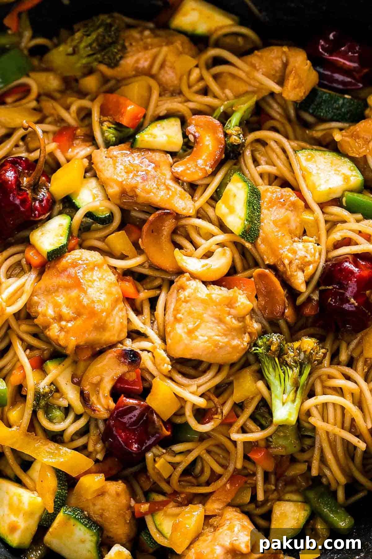 Stir-Fry Fundamentals 5 Chinese Cashew Chicken Noodles Stir-Fry in a pan.