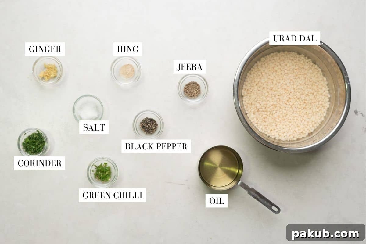 Picture of all the ingredients for medu vada with text overlay