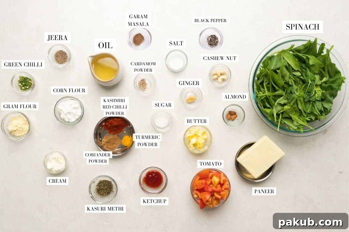 A flat lay of fresh ingredients for Shaam Savera, including spinach, tomatoes, paneer, cashews, almonds, ginger, and various spices.
