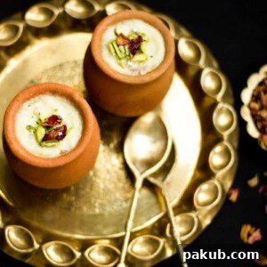 A charming picture of Mum's Gulab Phirni Recipe, a delightful rose-flavored rice pudding, ready to be savored.
