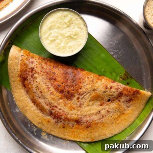 Millet Mysore Masala Dosa served on a steel plate with chutney and filter coffee, a wholesome breakfast