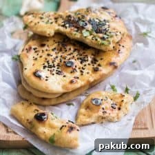 Pieces of instant no-yeast naan prepared in 30 minutes, showing a soft, puffy texture