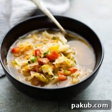 A comforting bowl of detox cabbage soup, perfect for a healthy reset.