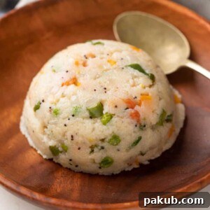 Vibrant Vegetable Semolina Upma 7 Fluffy Vegetable Upma served beautifully on a brown plate, ready to be enjoyed.