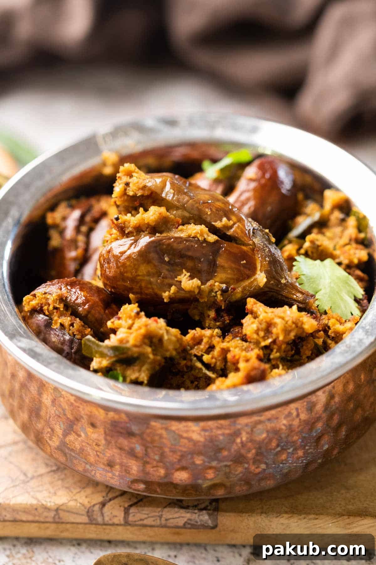 Flavorful Air Fryer Stuffed Eggplant 2 stuffed baingan served in a bowl
