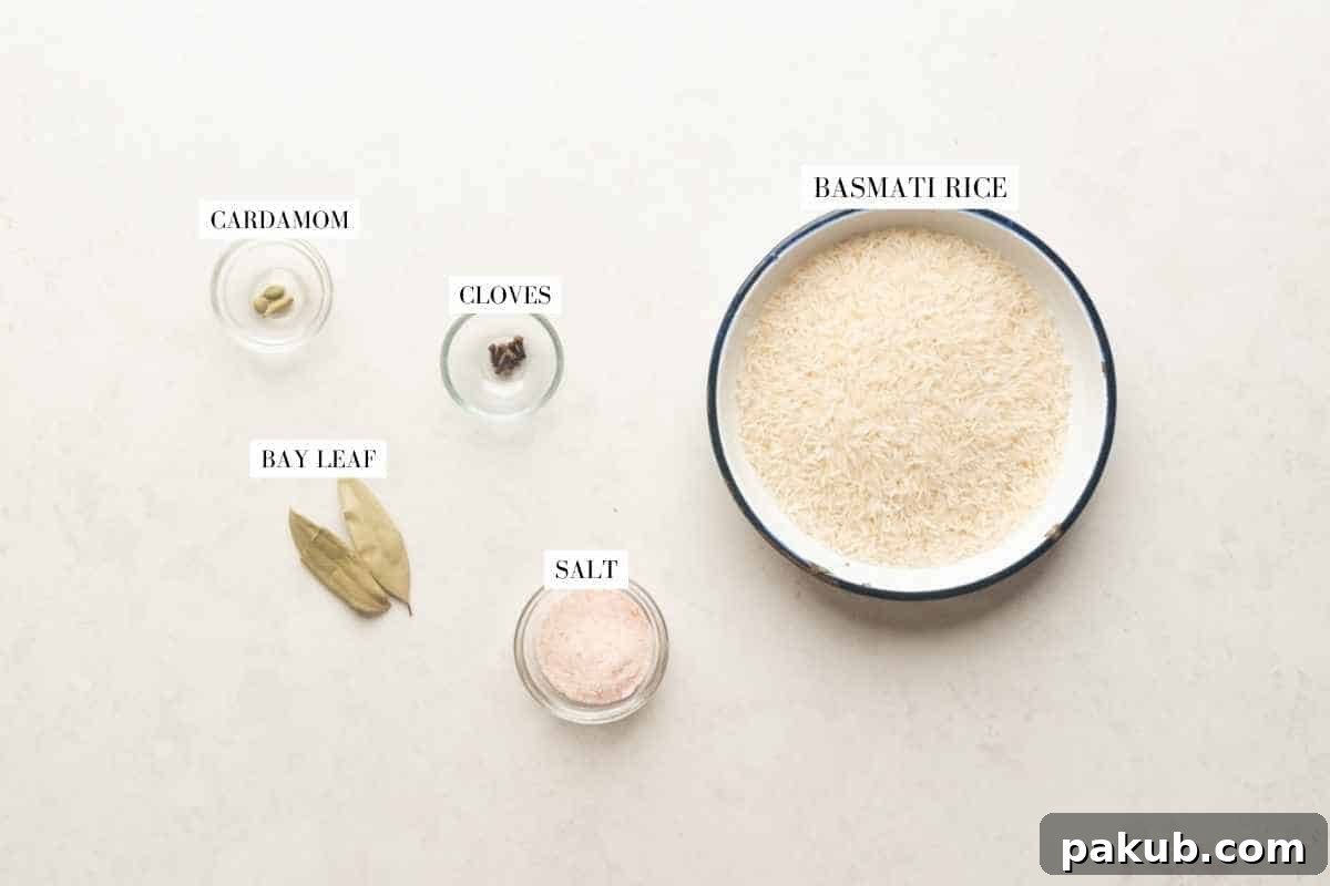 Aromatic Instant Pot Chicken Biryani 4 A closer look at the fresh basmati rice and whole aromatic spices, essential for building the biryani's fragrant rice layer.