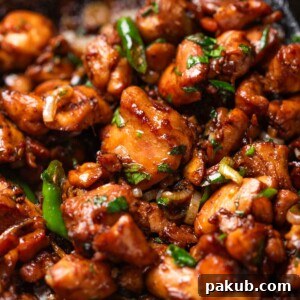 A close-up image of ginger chicken stir fry, showcasing its juicy and crispy texture for an appealing presentation.