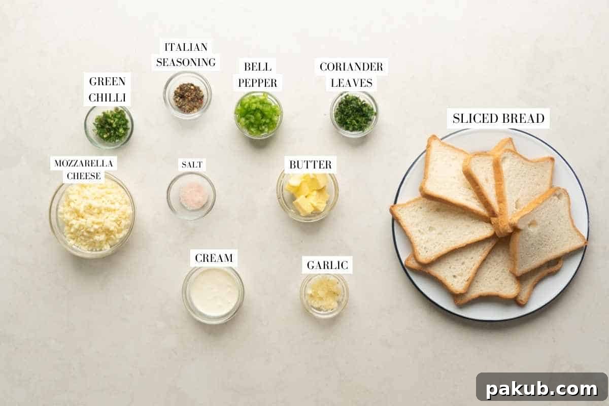 Fiery Cheese Garlic Bread 4 A visual guide displaying all the fresh ingredients needed for Chilli Cheese Garlic Bread, labeled for clarity: bread, mozzarella, garlic, cream, green chilies, capsicum, coriander, salt, Italian seasoning, and butter.