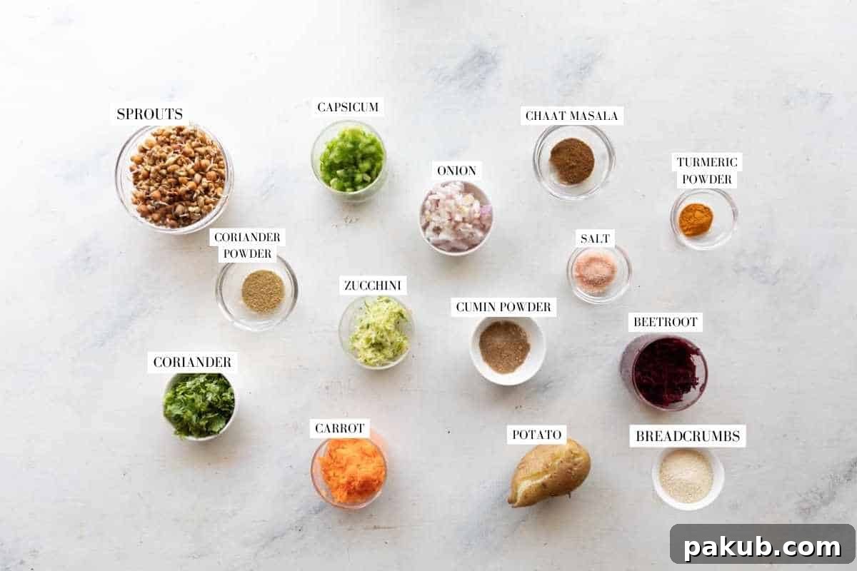 A beautifully arranged flat lay photo showcasing all the fresh, colorful ingredients required for making healthy sprouts cutlets, with labels for easy identification.