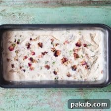 Creamy Thandai Ice Cream, garnished with nuts, ready to be enjoyed as a festive dessert.
